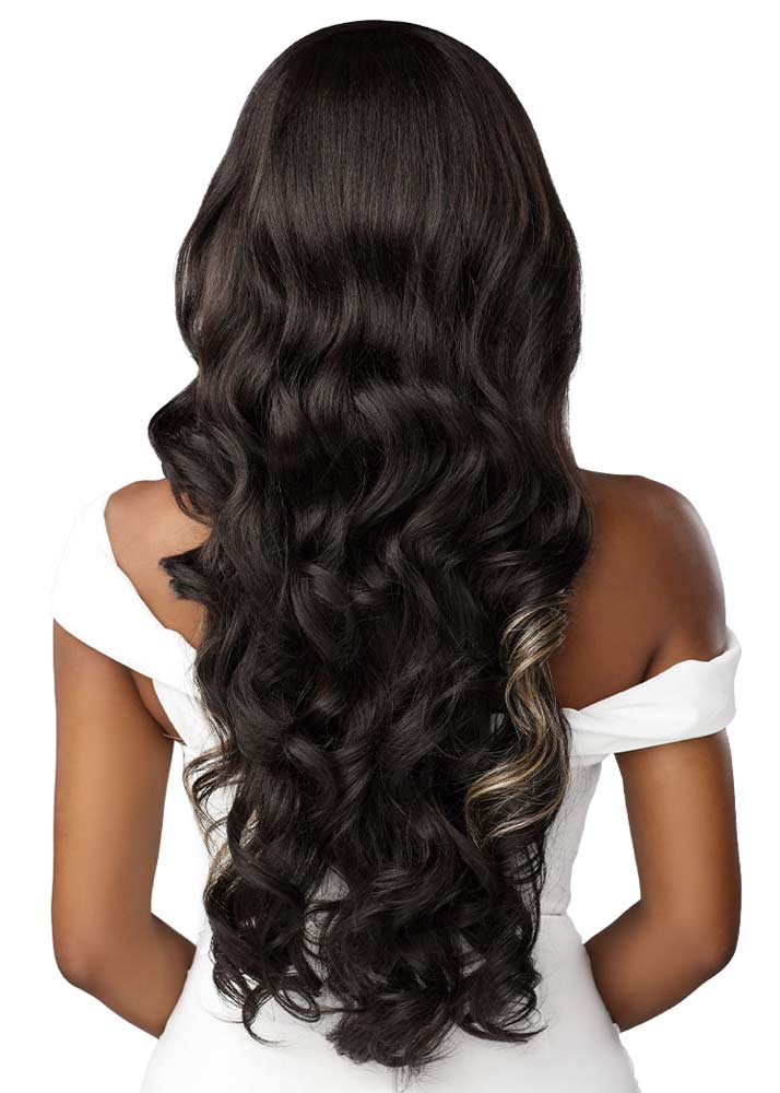 Black woman with long, wavy hair wearing sensationnel bare lace unit 8 wig in secret blonde highlight