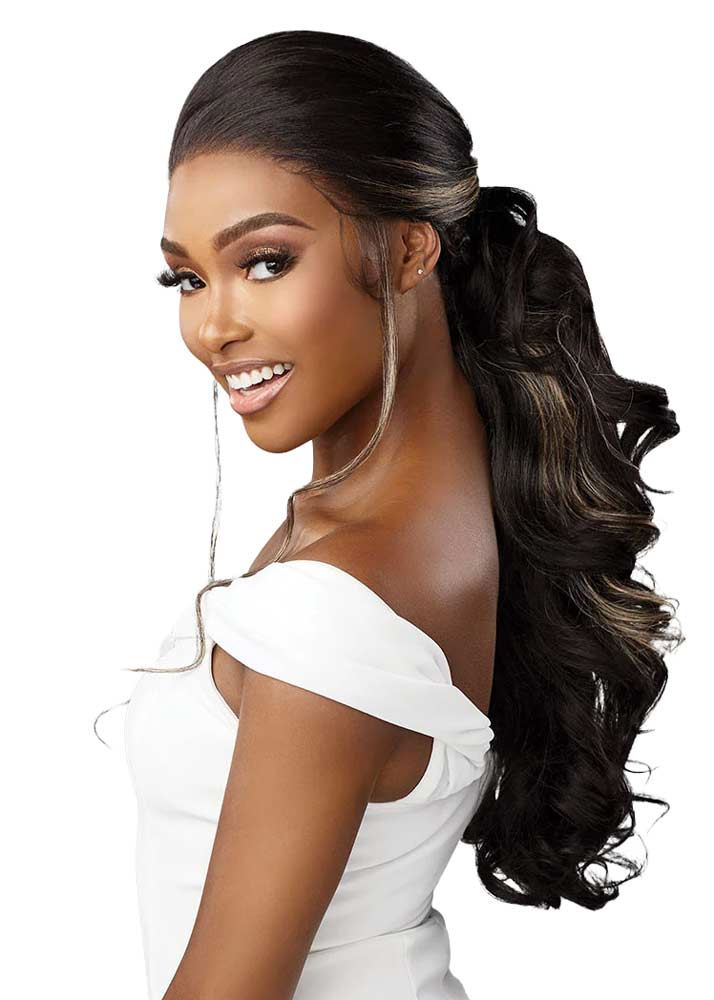 Black woman with long, wavy hair wearing sensationnel bare lace unit 8 wig styled into a half ponytail
