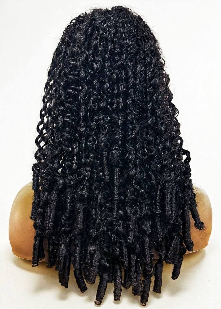 Black human hair wig on a mannequin head against a white background