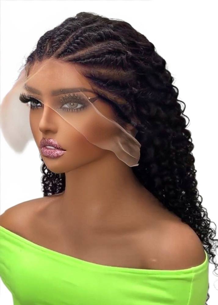 Woman with Modern Jayda Wayda styled wig wearing a green top on a white background