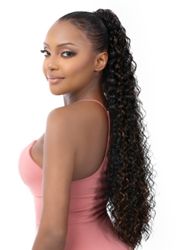 Woman with styled hair in a ponytail