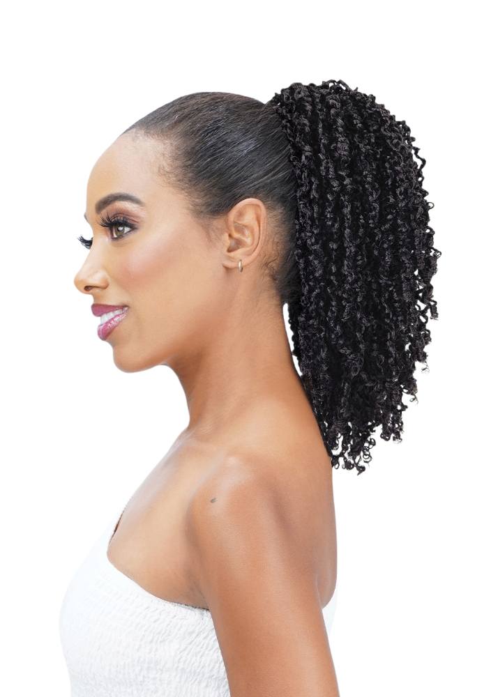 A woman shown in side profile wearing a high-volume black curly Yanky Twists ponytail extension, photographed against a clean white background.