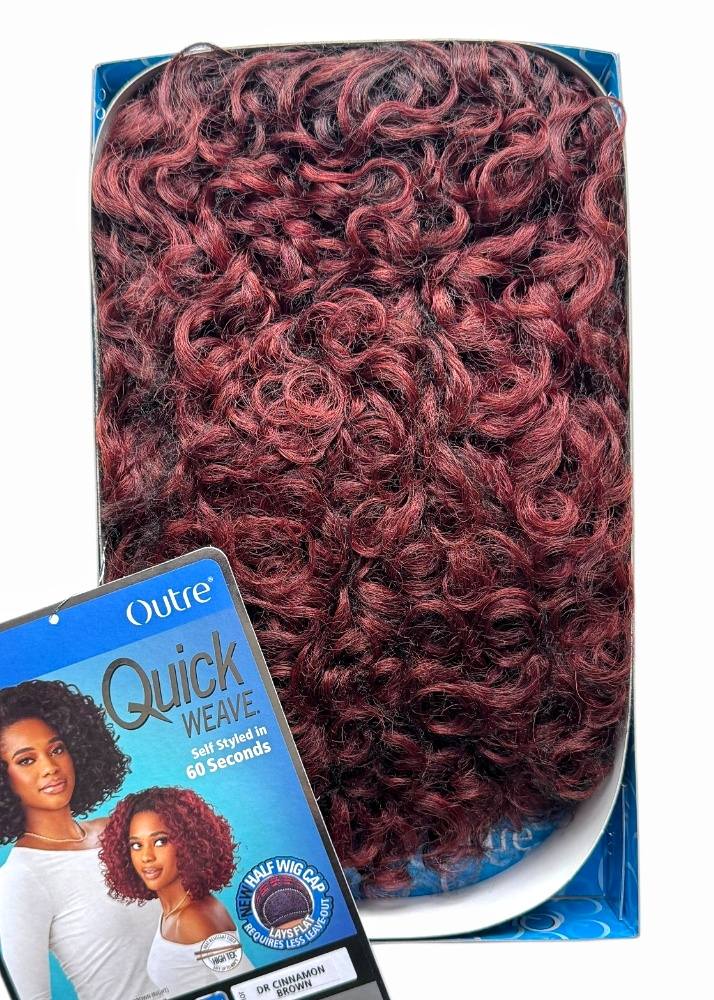Box of Outre Quick Weave hair product with red curly hair 